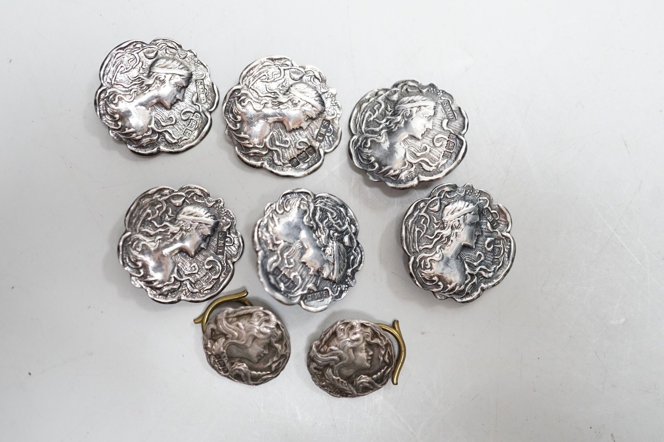 A set of six Edwardian silver buttons, S.M. Levi, Birmingham, 1902, 20mm, two other buttons and a cased set of six George V silver and enamel buttons.